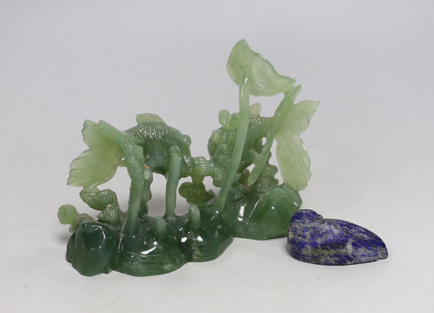 A Chinese bowenite jade goldfish group, 17cm wide, and a lapis lazuli figure of a duck